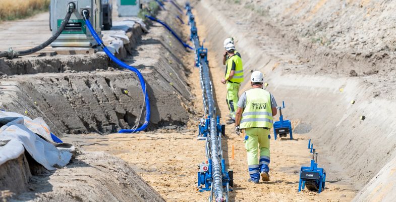 HV cable laying with construction workers